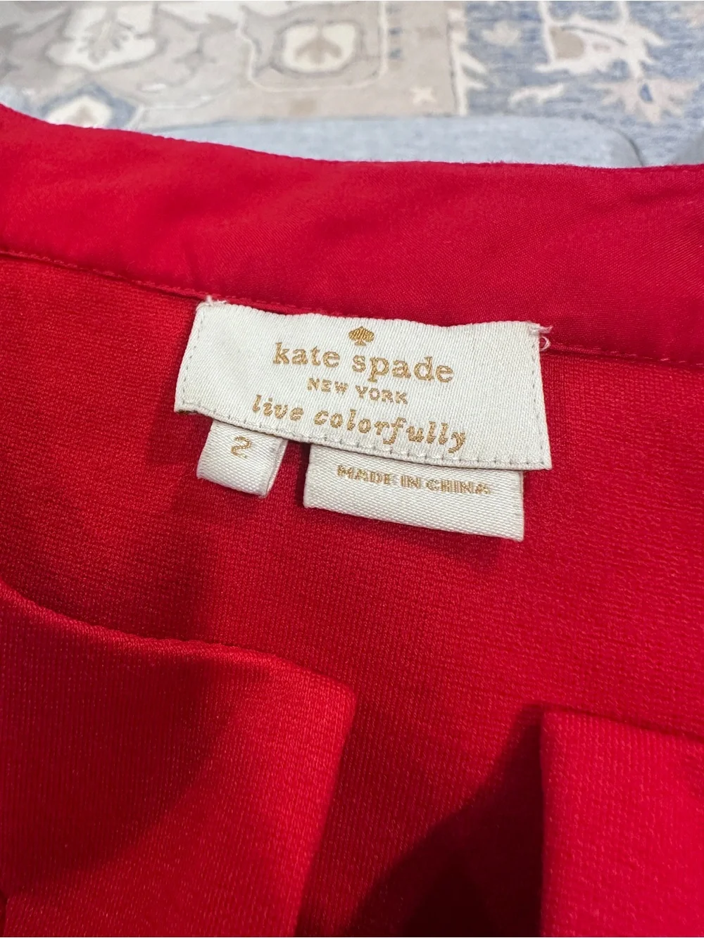 kate spade Sleeveless Red Bow-Front Peplum Blouse